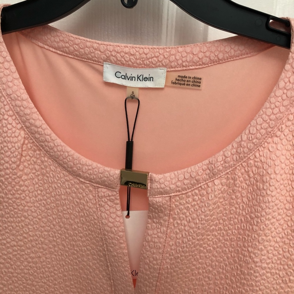 NWT. Calvin Klein Small Blouse. Peach color